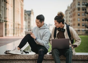 Photo by Armin  Rimoldi: https://www.pexels.com/photo/men-sitting-at-the-park-while-having-conversation-5554289/