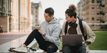 Photo by Armin  Rimoldi: https://www.pexels.com/photo/men-sitting-at-the-park-while-having-conversation-5554289/