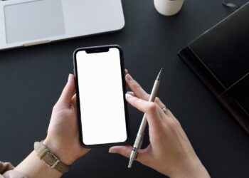 Photo by Artem Podrez: https://www.pexels.com/photo/person-holding-black-iphone-and-pen-6278754/