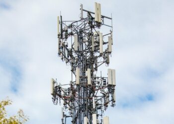 Photo by Caleb Oquendo: https://www.pexels.com/photo/cell-tower-between-trees-under-cloudy-sky-7388500/