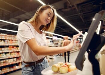 Photo by Gustavo Fring: https://www.pexels.com/photo/cheerful-woman-using-electronic-scales-in-supermarket-4173320/