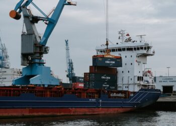 Photo by Kai Pilger: https://www.pexels.com/photo/blue-and-red-cargo-ship-with-crane-1544372/