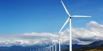 Photo by Kervin Edward Lara: https://www.pexels.com/photo/white-wind-turbines-on-gray-sand-near-body-of-water-3976320/