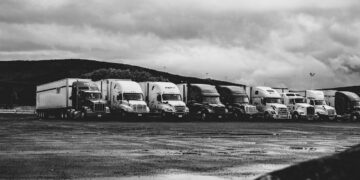 Photo by Kevin Bidwell: https://www.pexels.com/photo/parked-trucks-under-clouds-2348359/