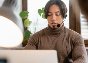 Photo by MART PRODUCTION: https://www.pexels.com/photo/man-in-brown-turtle-neck-shirt-with-headset-and-mouthpiece-7709244/