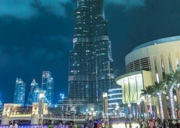 Photo by Zaib Azhar 📷 from Pexels: https://www.pexels.com/photo/people-standing-near-high-rise-building-during-night-time-1707310/