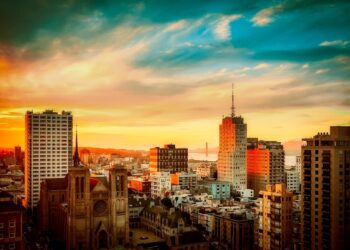 Photo by Pixabay: https://www.pexels.com/photo/buildings-under-cloudy-sky-during-sunset-462331/