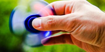 Photo by Tanino: https://www.pexels.com/photo/person-playing-blue-hand-spinner-448539/