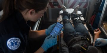 A Paramedic can now take advantage of a Samsung 5G enabled mobile device connected to the IBM Cloud platform to get vital stats for on other first responders in distress. (Photo attribution to Samsung Electronics Co., Ltd)