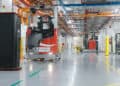 XSQUARE's autonomous forklifts seamlessly navigate Coca-Cola Singapore's facility, executing warehouse tasks with efficiency and precision.