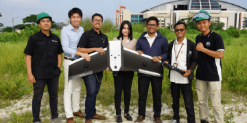 Terra Drone's crew members in Indonesia with the Terra Wing drone. PHOTO from Terra Drone